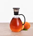 1,2 L karafa z borosilikátového skla s nerezovou výklopnou zátkou BOROSIL GLASS