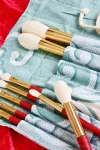 9 ks profesionálních přírodních štětců na make-up v látkovém pouzdře